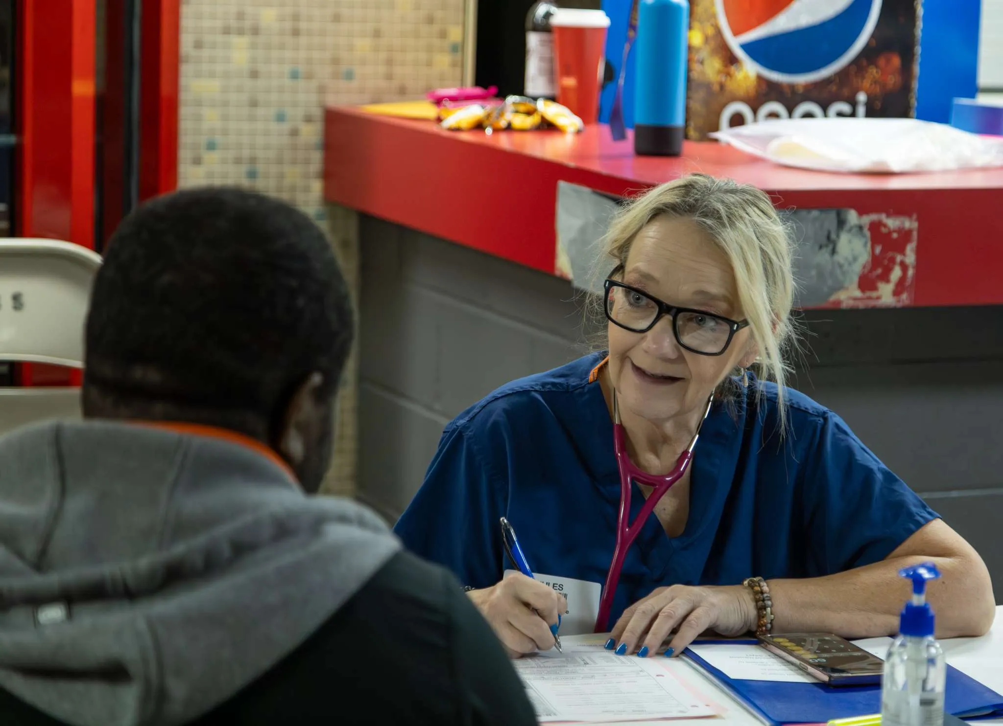 nurse provides preventive care at a RAM free clinic